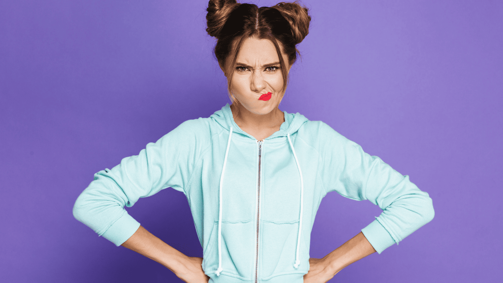 woman mad angry judging buns hands on hips