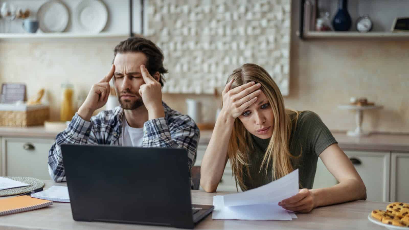 Broke man and woman with problems to pay the bills