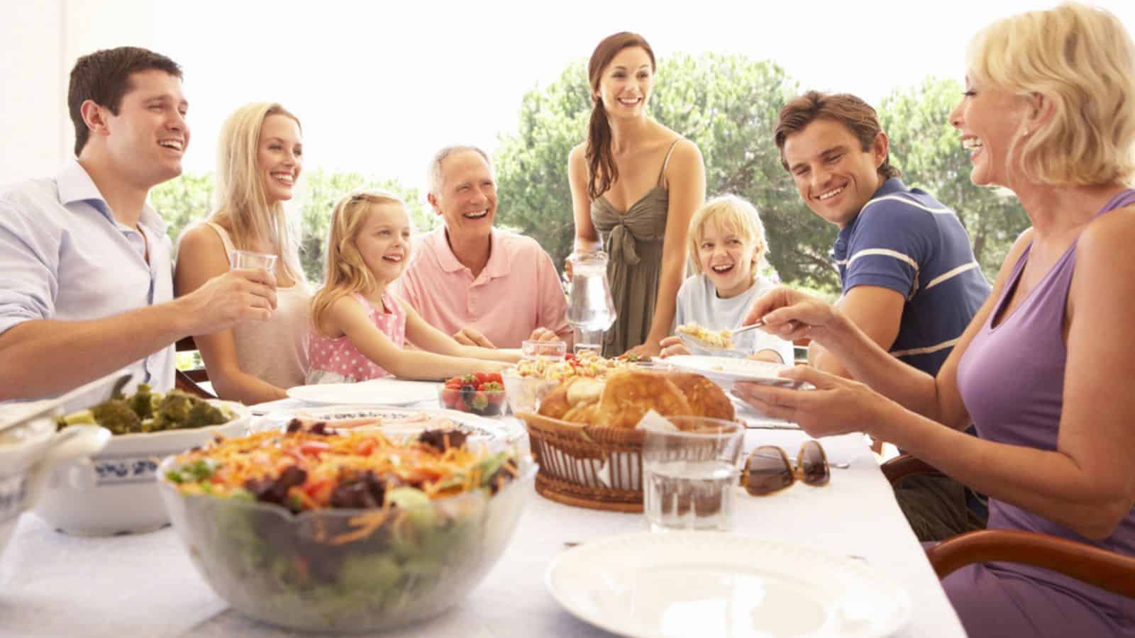 Family and friends enjoying their picnic