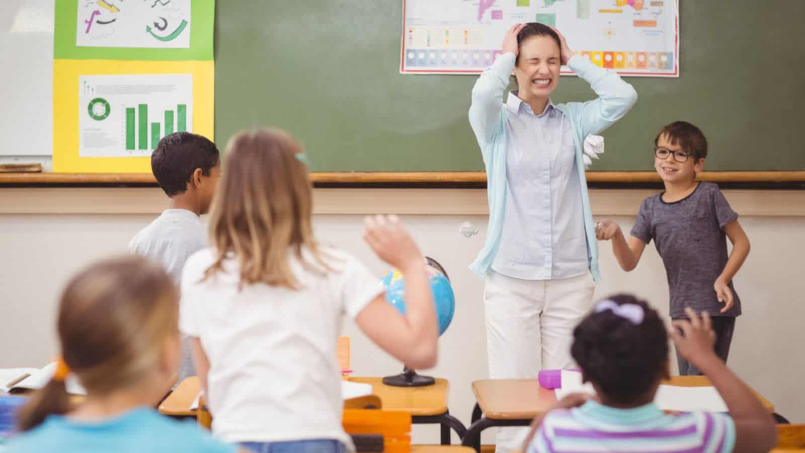 Frustrated teacher in classroom