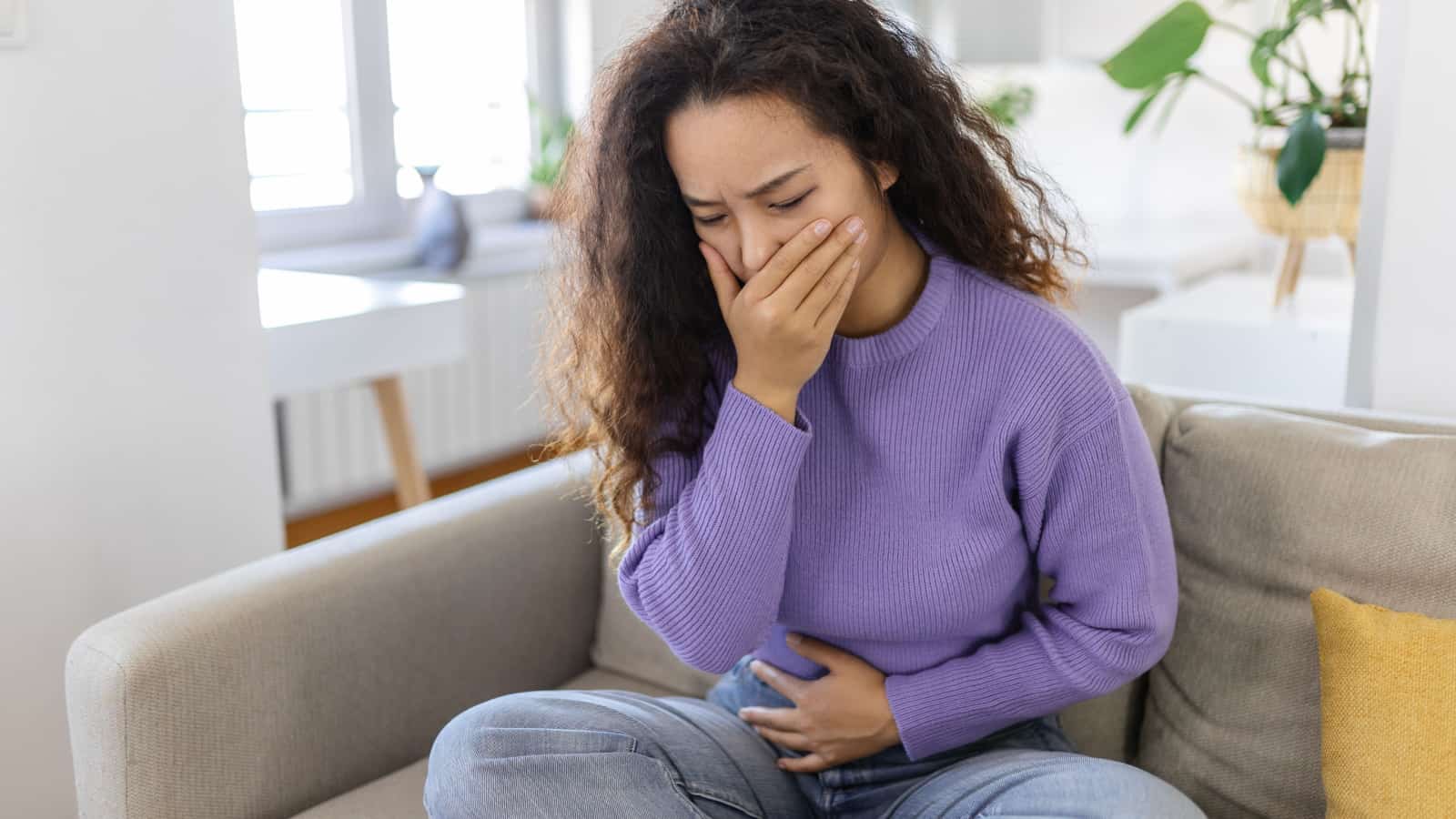 woman feeling sick, nausea