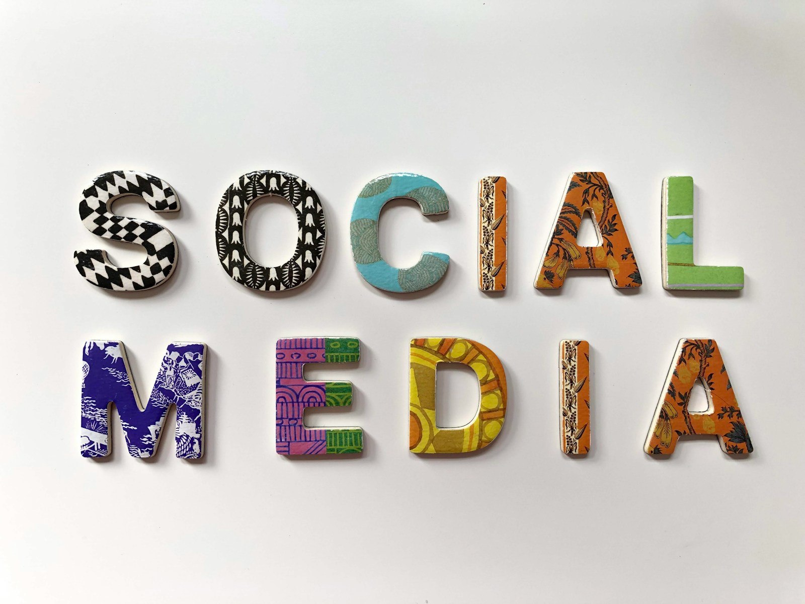 assorted-color social media signage; social media age verification laws