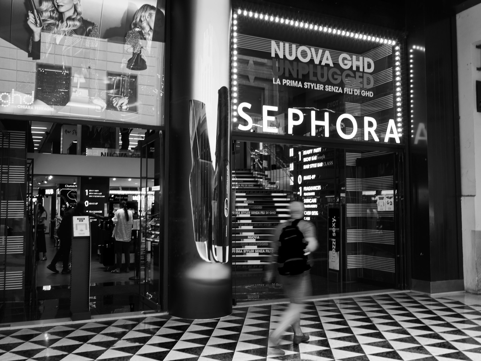 grayscale photo of people walking on sidewalk; Sephora kids trend